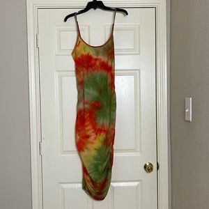 Don’t get it twisted! Tie dyed ad side twisted dress.